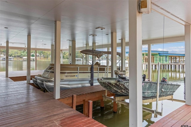 13735 Peninsula Rd, Whitehouse, TX 75791 - dock area featuring boat lift and a water view