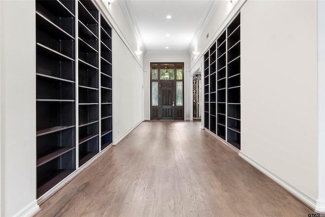 13735 Peninsula Rd, Whitehouse, TX 75791 - hall featuring ornamental molding, wood finished floors, recessed lighting, and built in features