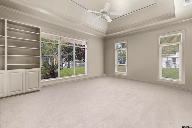 13735 Peninsula Rd, Whitehouse, TX 75791 - unfurnished room with a raised ceiling, light colored carpet, ornamental molding, and ceiling fan