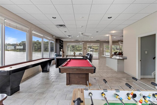 13735 Peninsula Rd, Whitehouse, TX 75791 - playroom with a ceiling fan, billiards table, a water view, recessed lighting, and light tile patterned floors