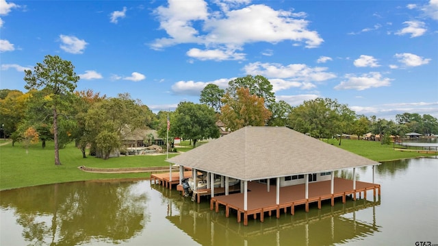 13735 Peninsula Rd, Whitehouse, TX 75791 - dock with a water view, boat lift, a lawn, and view of wooded area