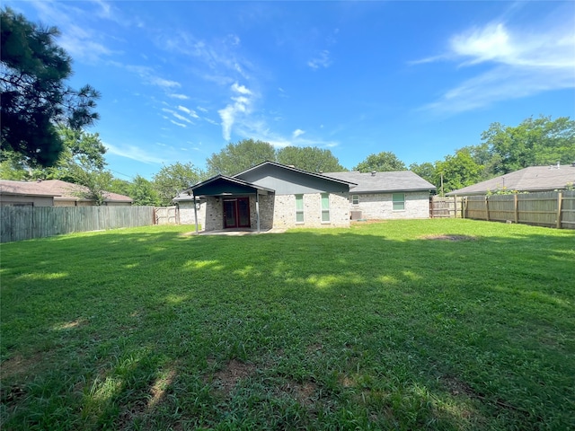 104 Kimberly St, Sulphur Springs, TX 75482 - back of property featuring a fenced backyard