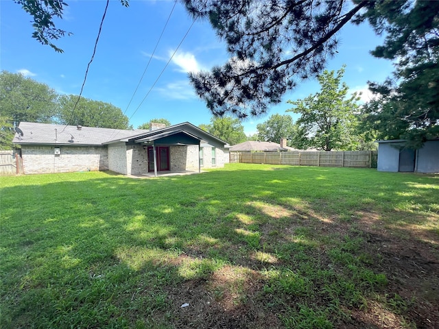 104 Kimberly St, Sulphur Springs, TX 75482 - fenced backyard featuring a patio area