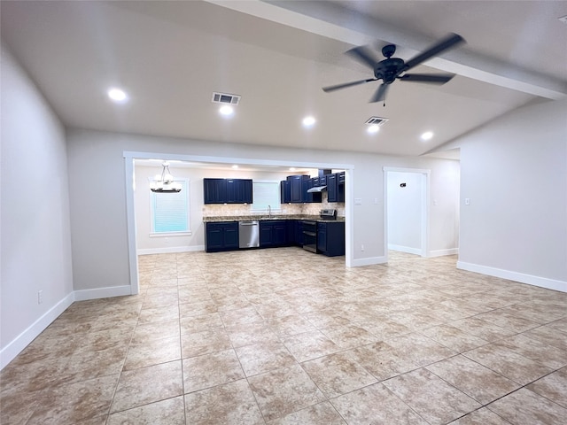 104 Kimberly St, Sulphur Springs, TX 75482 - unfurnished living room with lofted ceiling, ceiling fan, light tile patterned floors, recessed lighting, and a chandelier