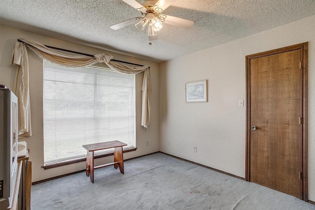 1000 Meadow Hill Rd, Fort Worth, TX 76108 - spare room with light colored carpet, a textured ceiling, and ceiling fan