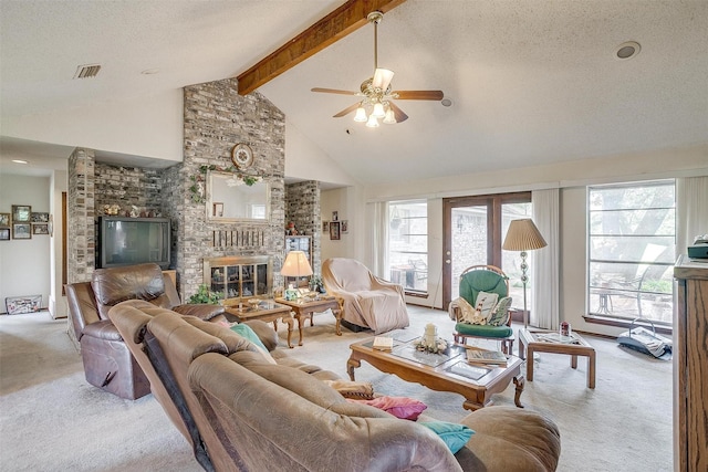 1000 Meadow Hill Rd, Fort Worth, TX 76108 - carpeted living area with beam ceiling, a fireplace, a ceiling fan, and high vaulted ceiling