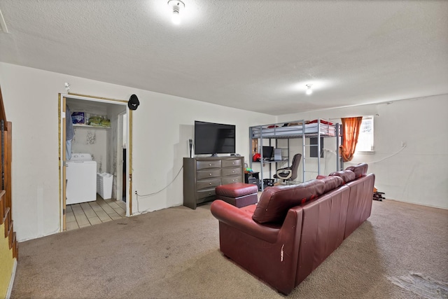 8412 E Fm 917, Alvarado, TX 76009 - carpeted living room with washer / clothes dryer and a textured ceiling