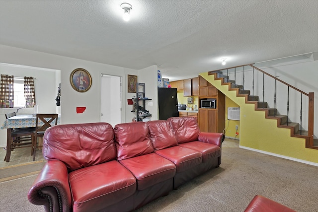 8412 E Fm 917, Alvarado, TX 76009 - living room featuring stairway, a textured ceiling, light colored carpet, and an AC wall unit