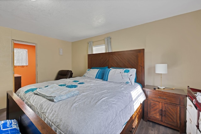 8412 E Fm 917, Alvarado, TX 76009 - bedroom with dark wood-style floors