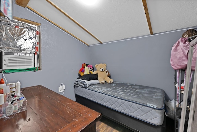 8412 E Fm 917, Alvarado, TX 76009 - bedroom featuring wood finished floors and vaulted ceiling