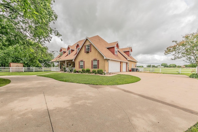 3148 Fm 66, Waxahachie, TX 75167 - view of front of property featuring concrete driveway, stucco siding, an attached garage, and a shingled roof