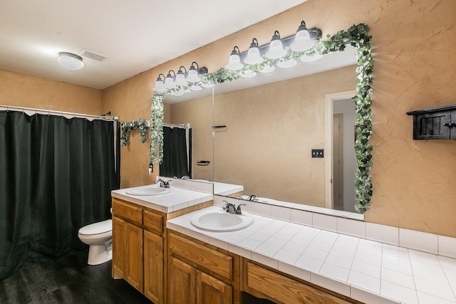 3148 Fm 66, Waxahachie, TX 75167 - bathroom featuring vanity, curtained shower, and wood finished floors