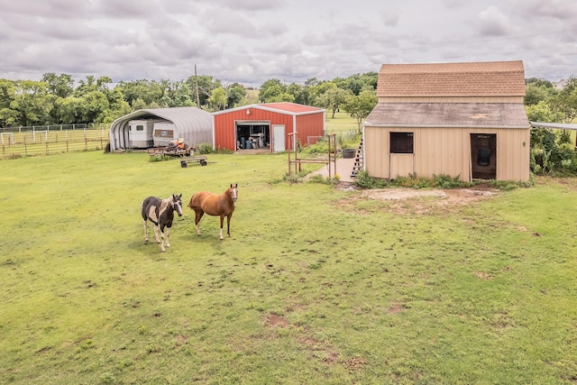 3148 Fm 66, Waxahachie, TX 75167 - view of yard with a detached garage, an outbuilding, a pole building, a carport, and a barn