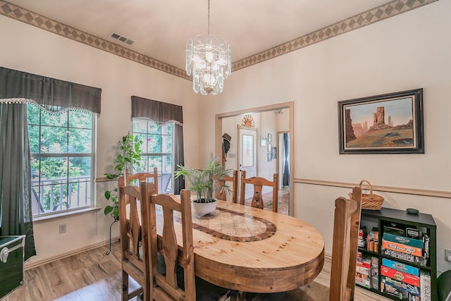 3148 Fm 66, Waxahachie, TX 75167 - dining space featuring plenty of natural light, a chandelier, and light wood-style floors