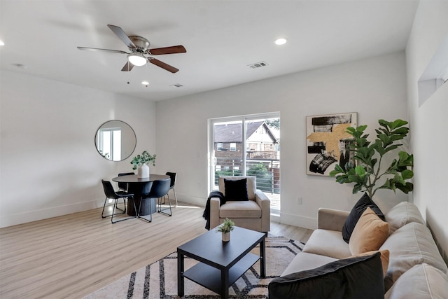 154 S Cisco St, Dallas, TX 75246 - living room with a ceiling fan, recessed lighting, and light wood-style floors