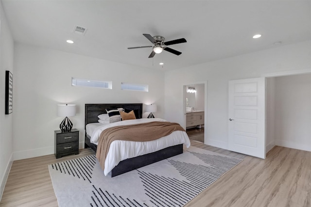 154 S Cisco St, Dallas, TX 75246 - bedroom featuring light wood-style flooring, connected bathroom, recessed lighting, and ceiling fan