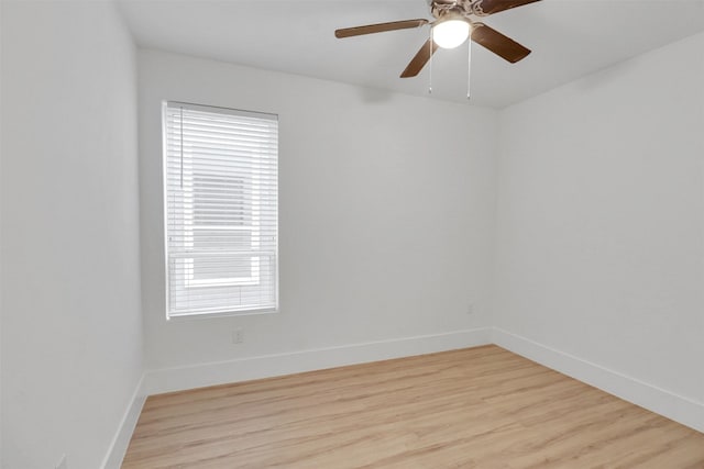 154 S Cisco St, Dallas, TX 75246 - unfurnished room featuring light wood-style floors and ceiling fan