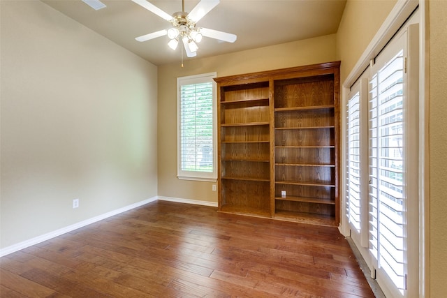 3506 Ash Cir, Richardson, TX 75082 - unfurnished room with hardwood / wood-style flooring, ceiling fan, and vaulted ceiling
