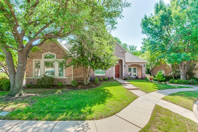 3506 Ash Cir, Richardson, TX 75082 - traditional-style house featuring brick siding and a front yard