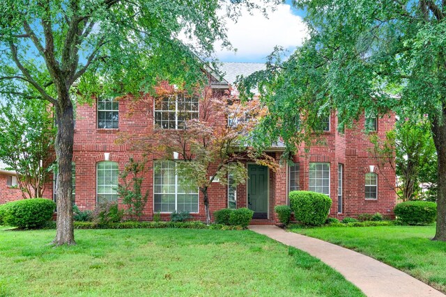 4512 Greenfield Dr, Richardson, TX 75082 - view of front of property featuring a front lawn and brick siding