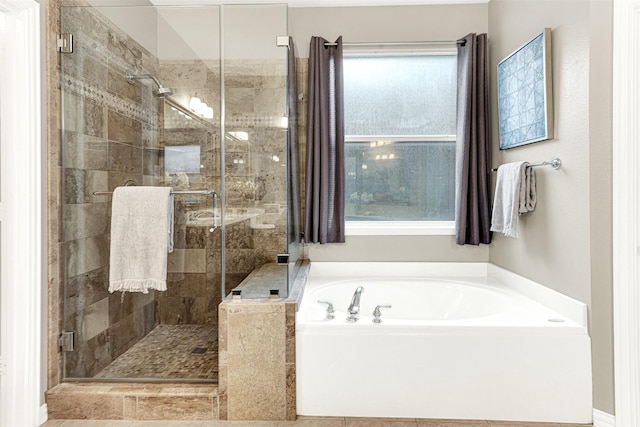 4512 Greenfield Dr, Richardson, TX 75082 - full bathroom with a garden tub and a stall shower