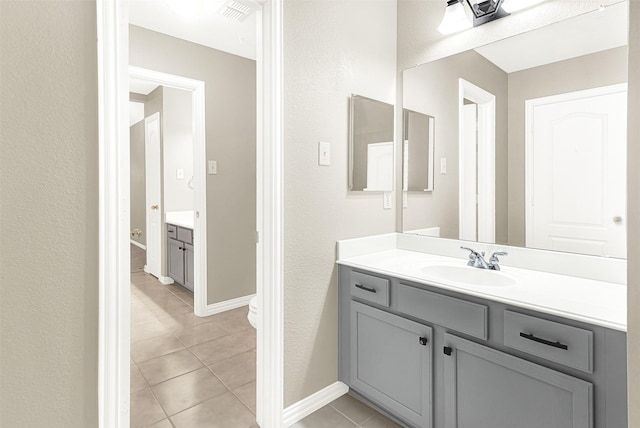 4512 Greenfield Dr, Richardson, TX 75082 - bathroom with vanity and tile patterned floors