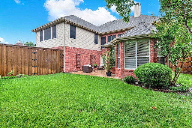 4512 Greenfield Dr, Richardson, TX 75082 - back of property featuring brick siding, a patio area, a fenced backyard, a chimney, and an outdoor living space