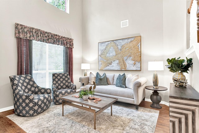4512 Greenfield Dr, Richardson, TX 75082 - living area with a towering ceiling and wood finished floors