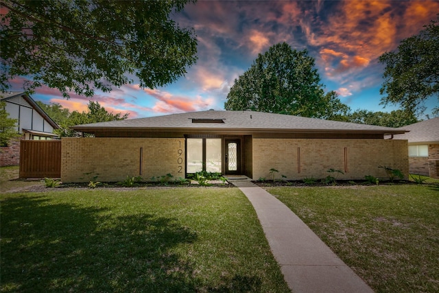 1902 Vassar Dr, Richardson, TX 75081 - view of front of home featuring brick siding