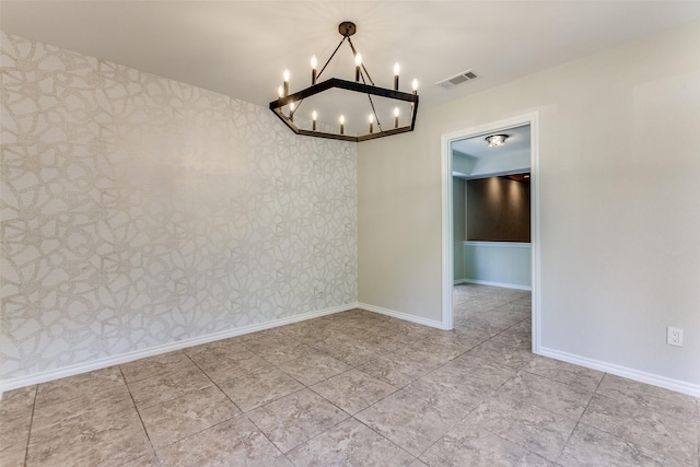 1902 Vassar Dr, Richardson, TX 75081 - spare room with a chandelier and wallpapered walls