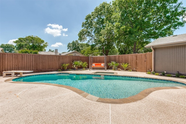 1902 Vassar Dr, Richardson, TX 75081 - view of swimming pool featuring a fenced backyard, an in-ground hot tub, and a patio area