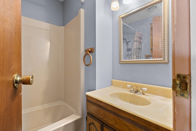 1210 E Fm 902, Howe, TX 75459 - full bathroom with vanity, shower / bathtub combination with curtain, and a textured wall