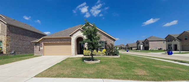 912 Newberry Ln, Royse City, TX 75189 - french country style house featuring brick siding, a residential view, an attached garage, and a front yard