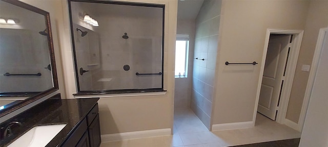 912 Newberry Ln, Royse City, TX 75189 - bathroom featuring a walk in shower, vanity, and tile patterned floors