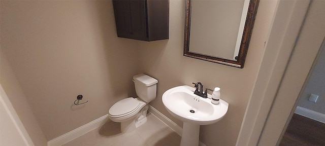 912 Newberry Ln, Royse City, TX 75189 - half bathroom featuring toilet and tile patterned flooring