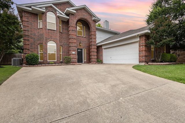 838 Bear Branch Ct, Rockwall, TX 75087 - traditional-style home with brick siding, driveway, a garage, and a chimney