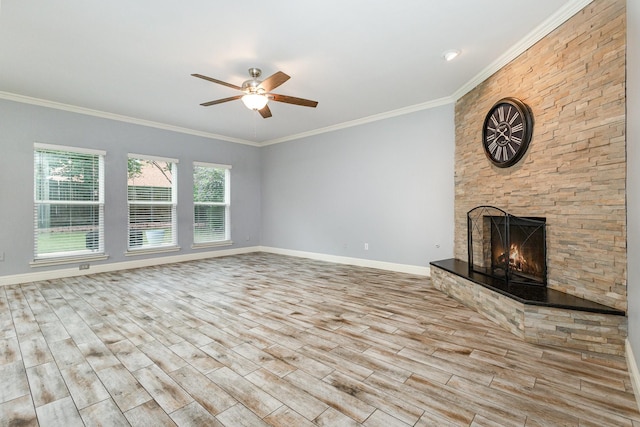 838 Bear Branch Ct, Rockwall, TX 75087 - unfurnished living room with ceiling fan, a stone fireplace, wood finished floors, and ornamental molding