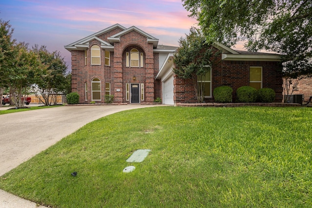 838 Bear Branch Ct, Rockwall, TX 75087 - traditional home featuring concrete driveway, brick siding, a front lawn, and a garage