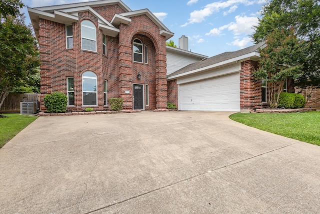 838 Bear Branch Ct, Rockwall, TX 75087 - view of front facade with brick siding, driveway, and a garage