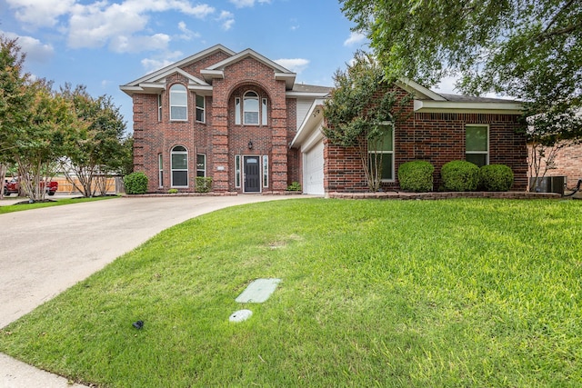 838 Bear Branch Ct, Rockwall, TX 75087 - traditional home featuring brick siding, concrete driveway, a front yard, and a garage