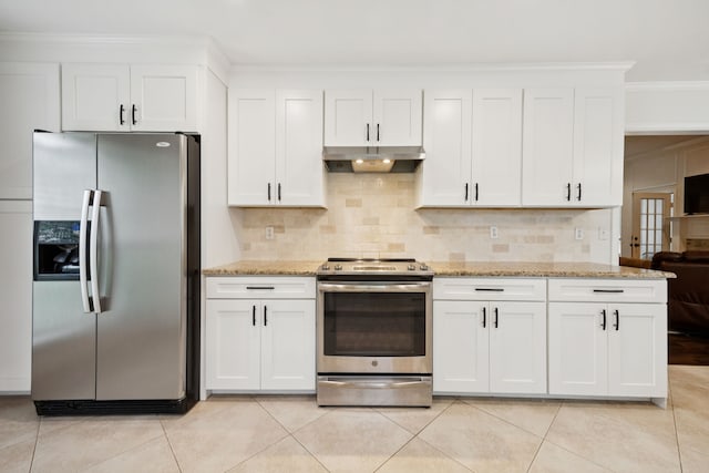 312 Bluffview Ct, Forney, TX 75126 - kitchen with appliances with stainless steel finishes, under cabinet range hood, ornamental molding, and tasteful backsplash