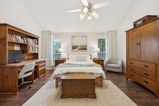312 Bluffview Ct, Forney, TX 75126 - bedroom with multiple windows, dark wood-style flooring, built in desk, ceiling fan, and high vaulted ceiling