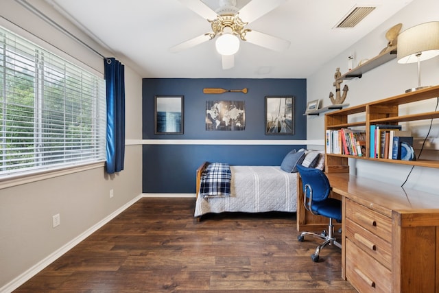 312 Bluffview Ct, Forney, TX 75126 - bedroom featuring wood finished floors and built in desk
