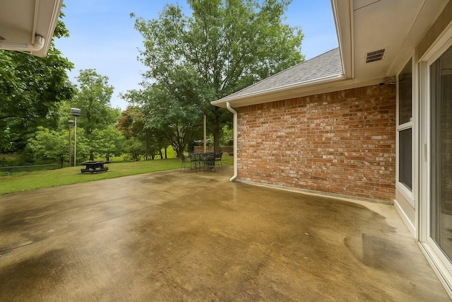 312 Bluffview Ct, Forney, TX 75126 - view of patio with outdoor dining space and view of scattered trees