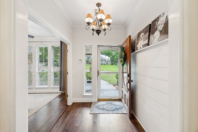 312 Bluffview Ct, Forney, TX 75126 - entryway featuring dark wood-style flooring, a chandelier, and ornamental molding