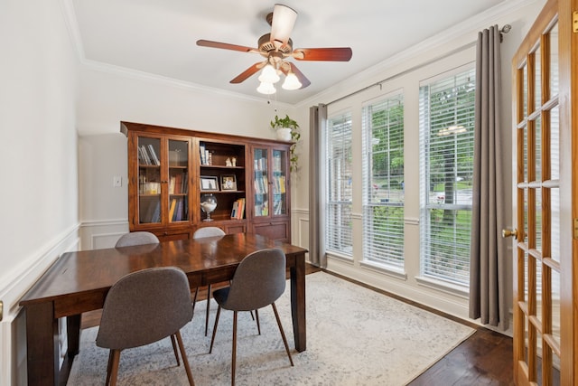 312 Bluffview Ct, Forney, TX 75126 - dining space featuring ornamental molding, wood finished floors, a ceiling fan, and wainscoting
