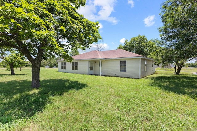 1206 Fm 902, Howe, TX 75090 - back of property featuring a yard