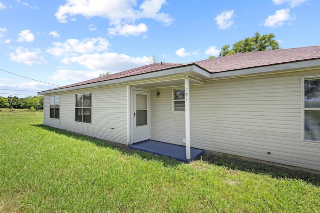1206 Fm 902, Howe, TX 75090 - rear view of property featuring a yard