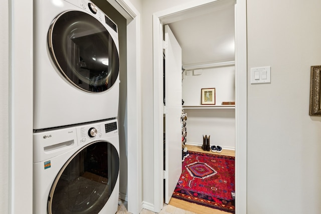 6227 Bandera Ave Unit D, Dallas, TX 75225 - laundry area with stacked washing machine and dryer