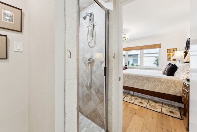 6227 Bandera Ave Unit D, Dallas, TX 75225 - full bath with ensuite bathroom, wood finished floors, and a stall shower